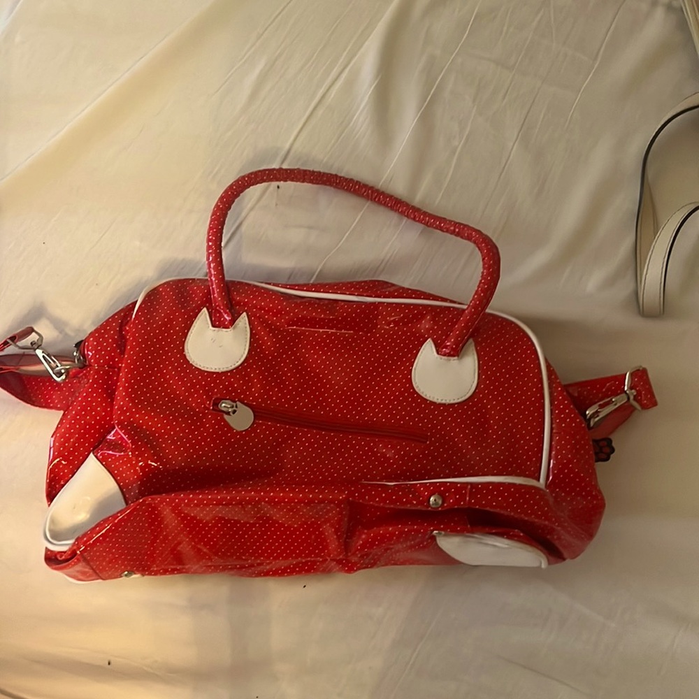Red and white cat bag